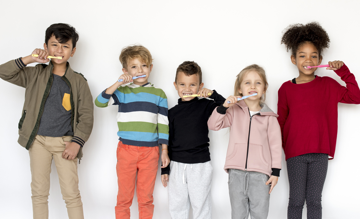 Kids with toothbrushes
